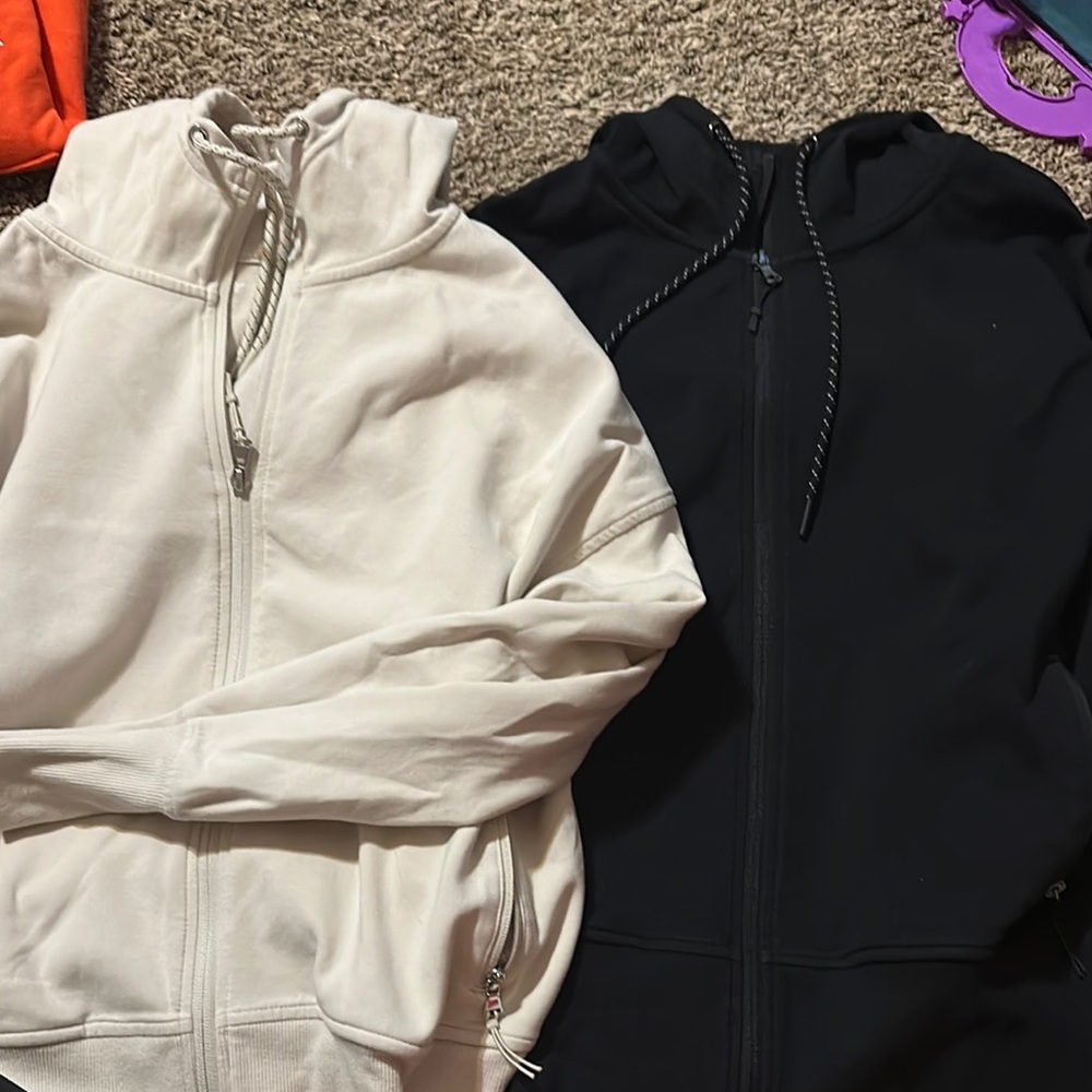 White and Black Zip-Up Hoodies